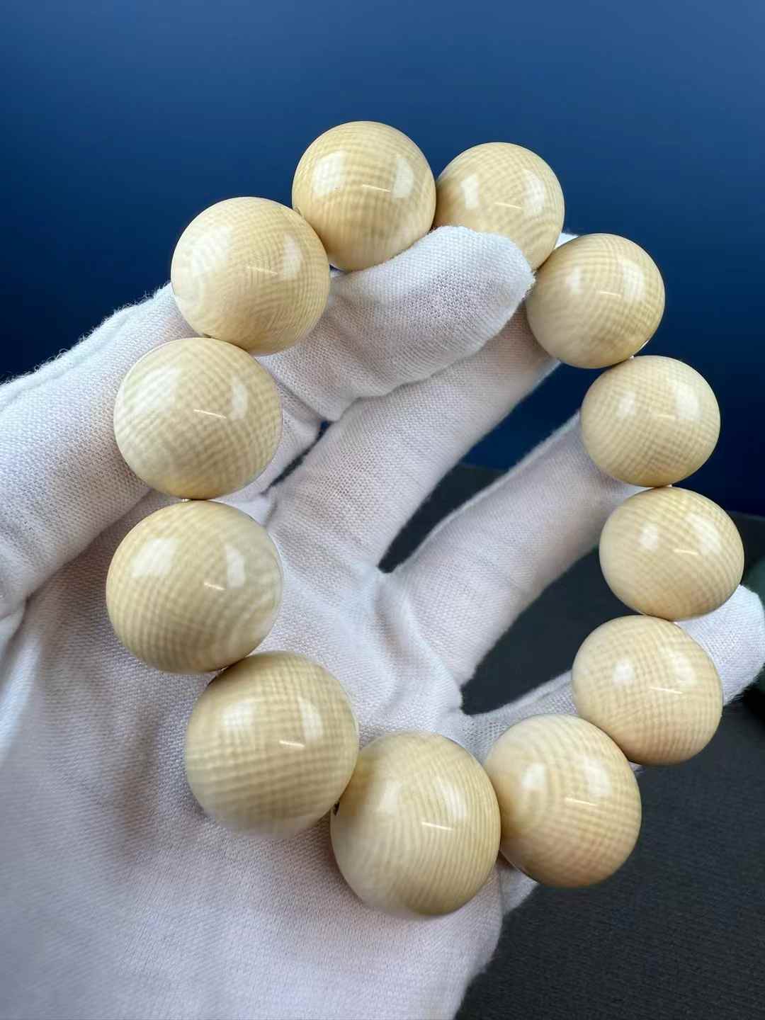 Gelang manik bulat berwarna kopi