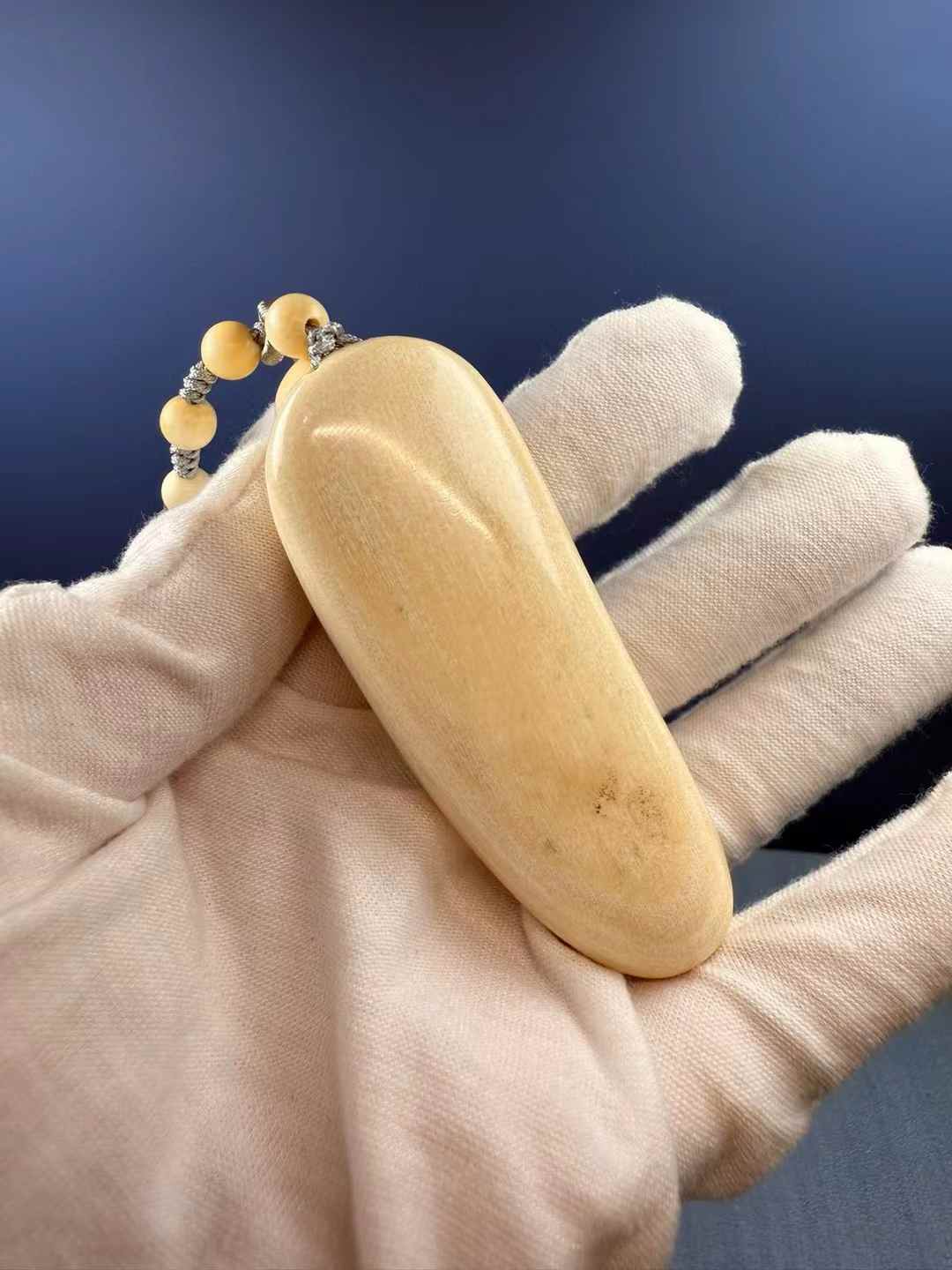 Wealth-Bringing Maitreya Tusk Handheld