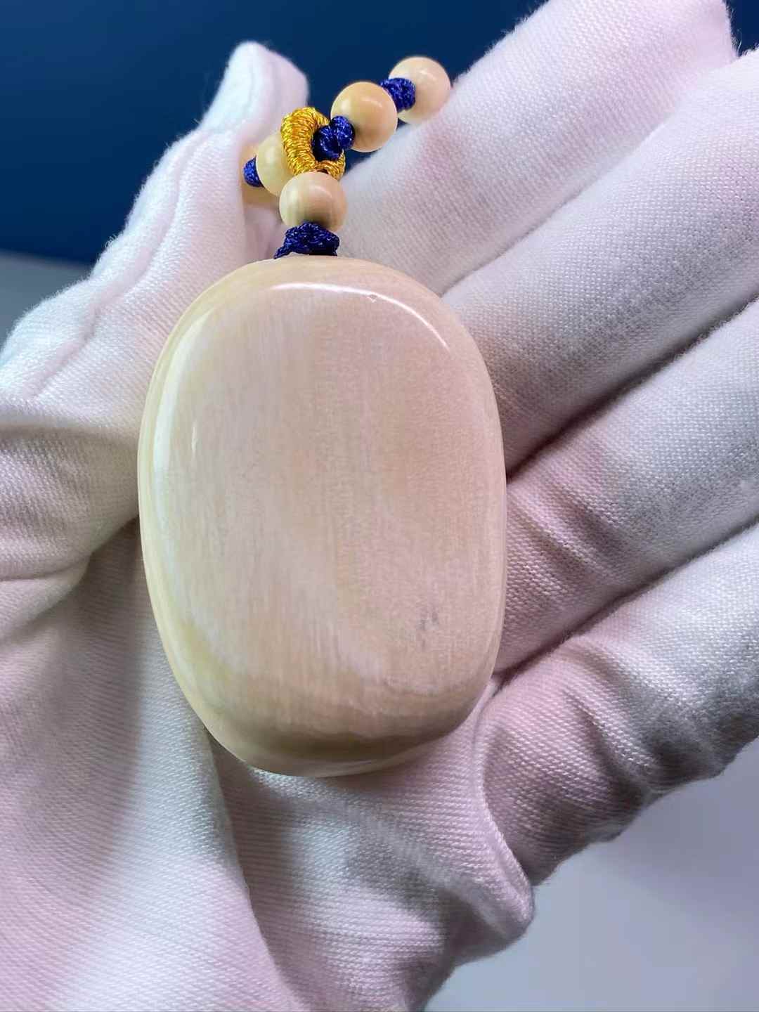 Wealth-Bringing Maitreya Tusk Handheld