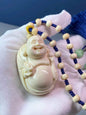 Wealth-Bringing Maitreya Tusk Handheld