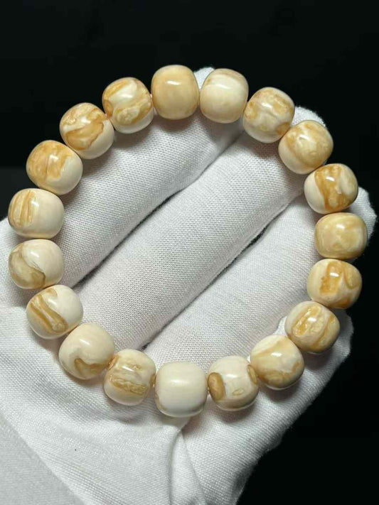 11/10mm Scarred Ivory Pulp Bracelet